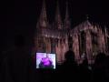 "1977" projected on the roof of the Museum Ludwig, Cologne. The Cathedral in the background. 2001.